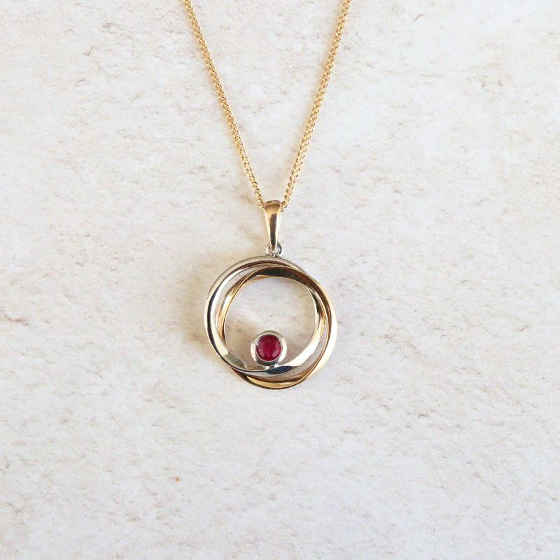 Two Tone Gold Entwined Circles with Ruby Pendant
